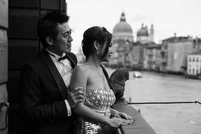Taiwanese couple standing on a terrace during a pre-wedding photo shooting in Venice