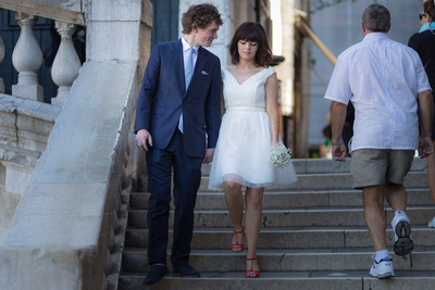 British couple walking in Venice during wedding photo reportage